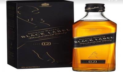 trago de wisky black label  5 elementos spa en medellin